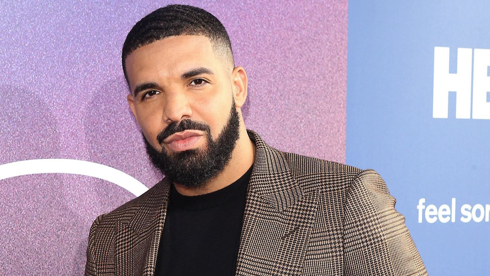 drake-montre-premiere-fois-visage-fils-adonis